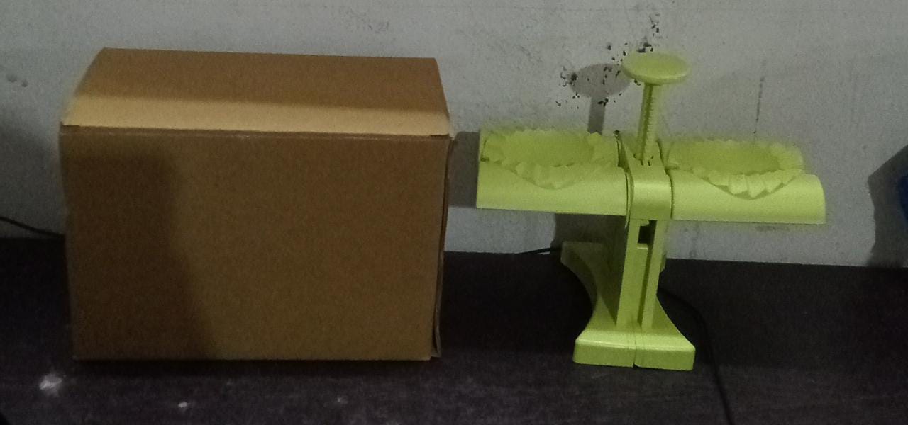 Dumpling press mold in brown box packaging Dumpling press mold in brown box packaging